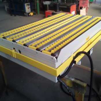 Sollevatore con rulli e packrail a scomparsa